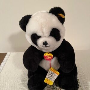 Charming Vintage Steiff Cosy Panda Bear plush stuffed animal.